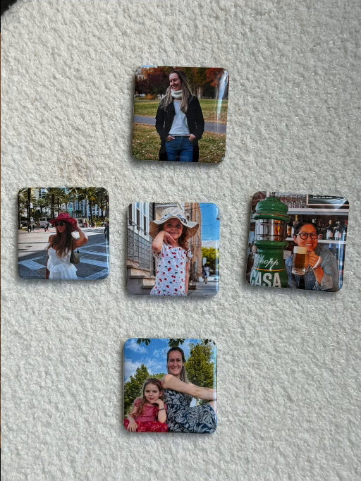 Personalized photo magnets on a refrigerator