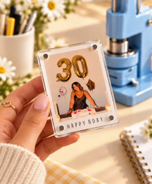 Polaroid-style acrylic birthday memory magnet close-up